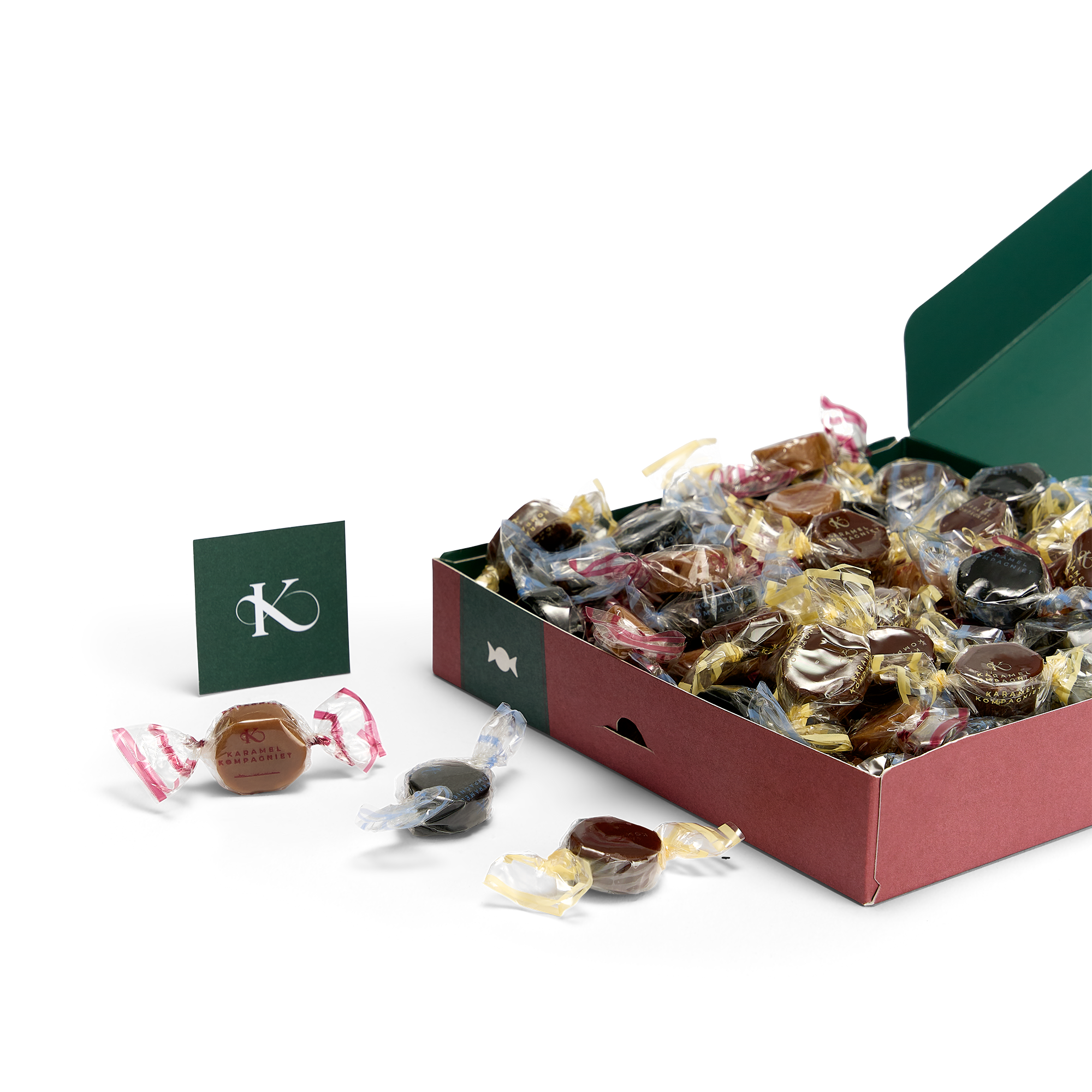 Glædelig Jul julekaramelblanding med flødekarameller, lakridskarameller og chokoladekarameller i en Q2 juleæske der ligger ned og er åben