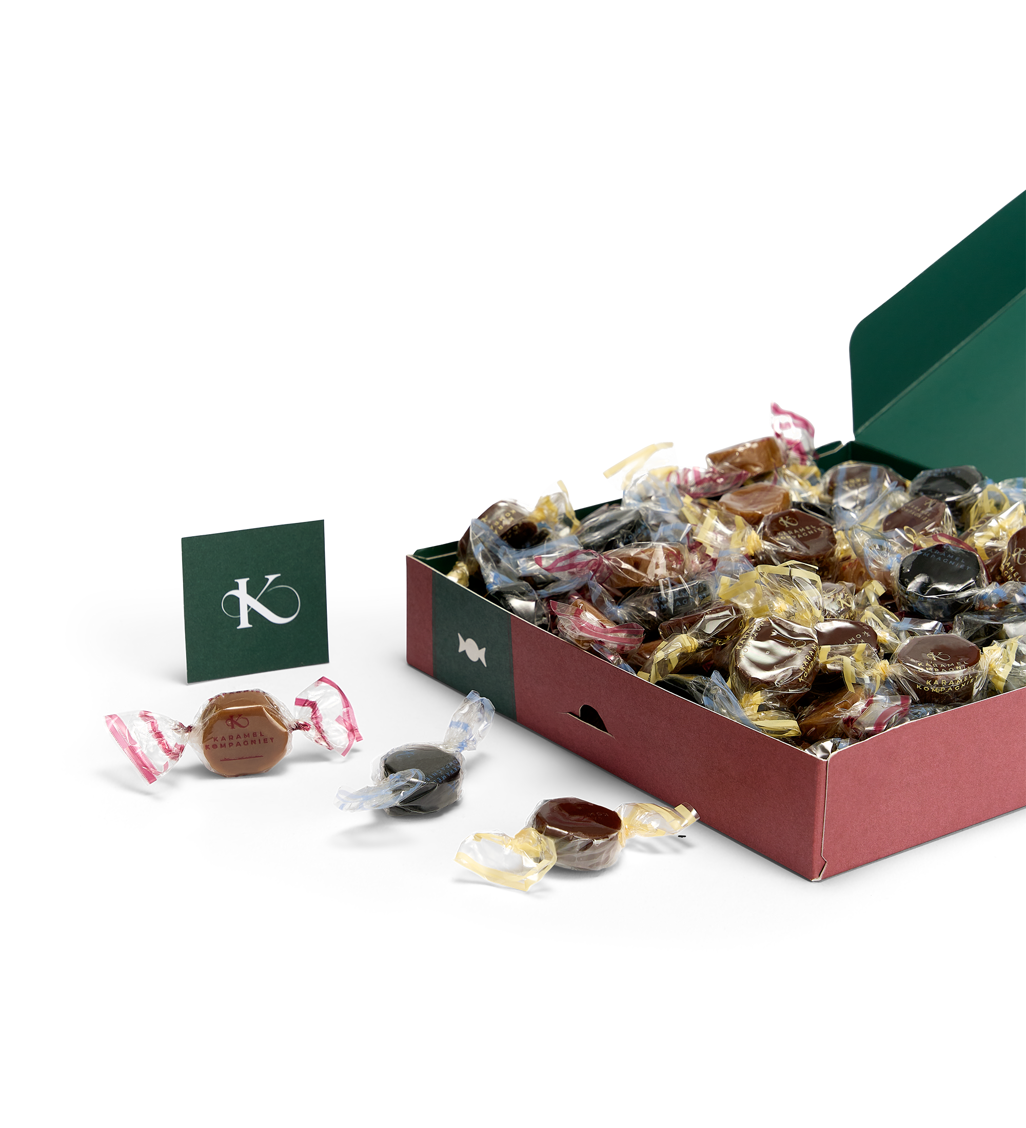 Glædelig Jul julekaramelblanding med flødekarameller, lakridskarameller og chokoladekarameller i en Q2 juleæske der ligger ned og er åben