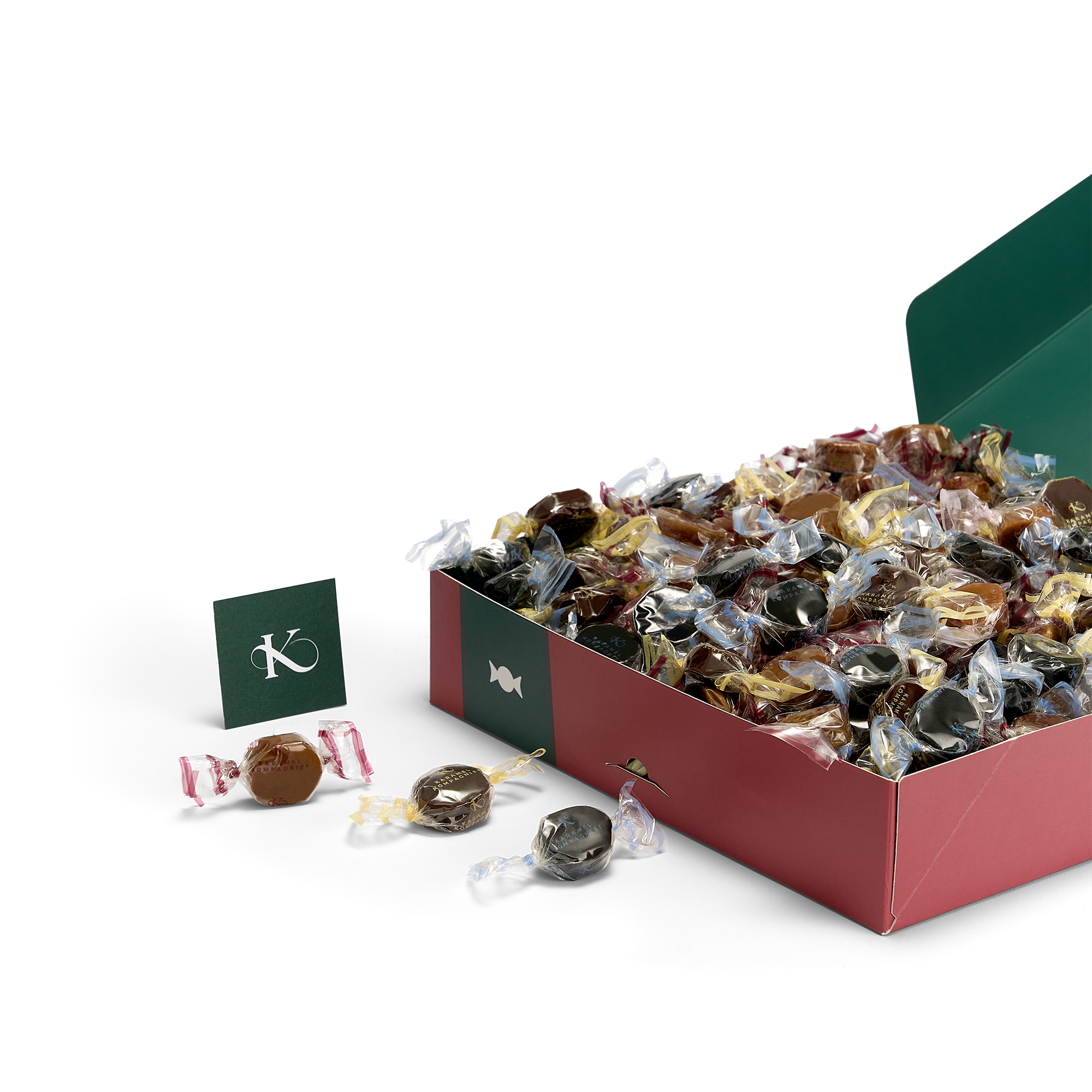 Glædelig Jul julekaramelblanding med flødekarameller, lakridskarameller og chokoladekarameller i en Q3 juleæske der ligger ned og er åben