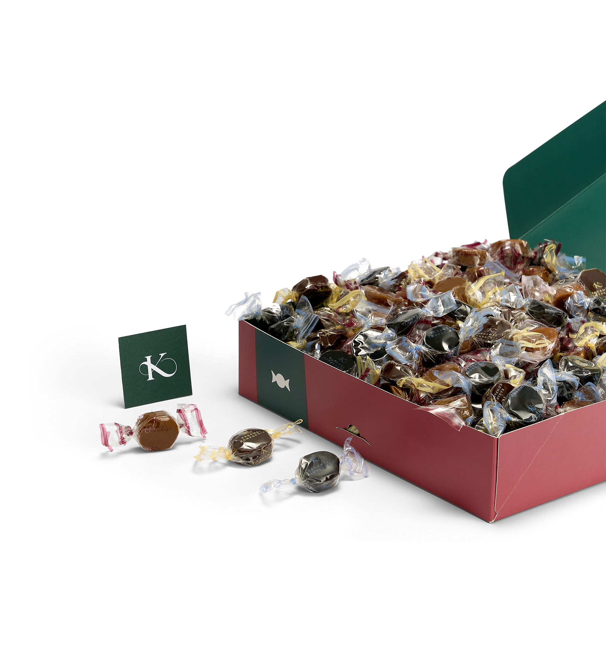 Glædelig Jul julekaramelblanding med flødekarameller, lakridskarameller og chokoladekarameller i en Q3 juleæske der ligger ned og er åben