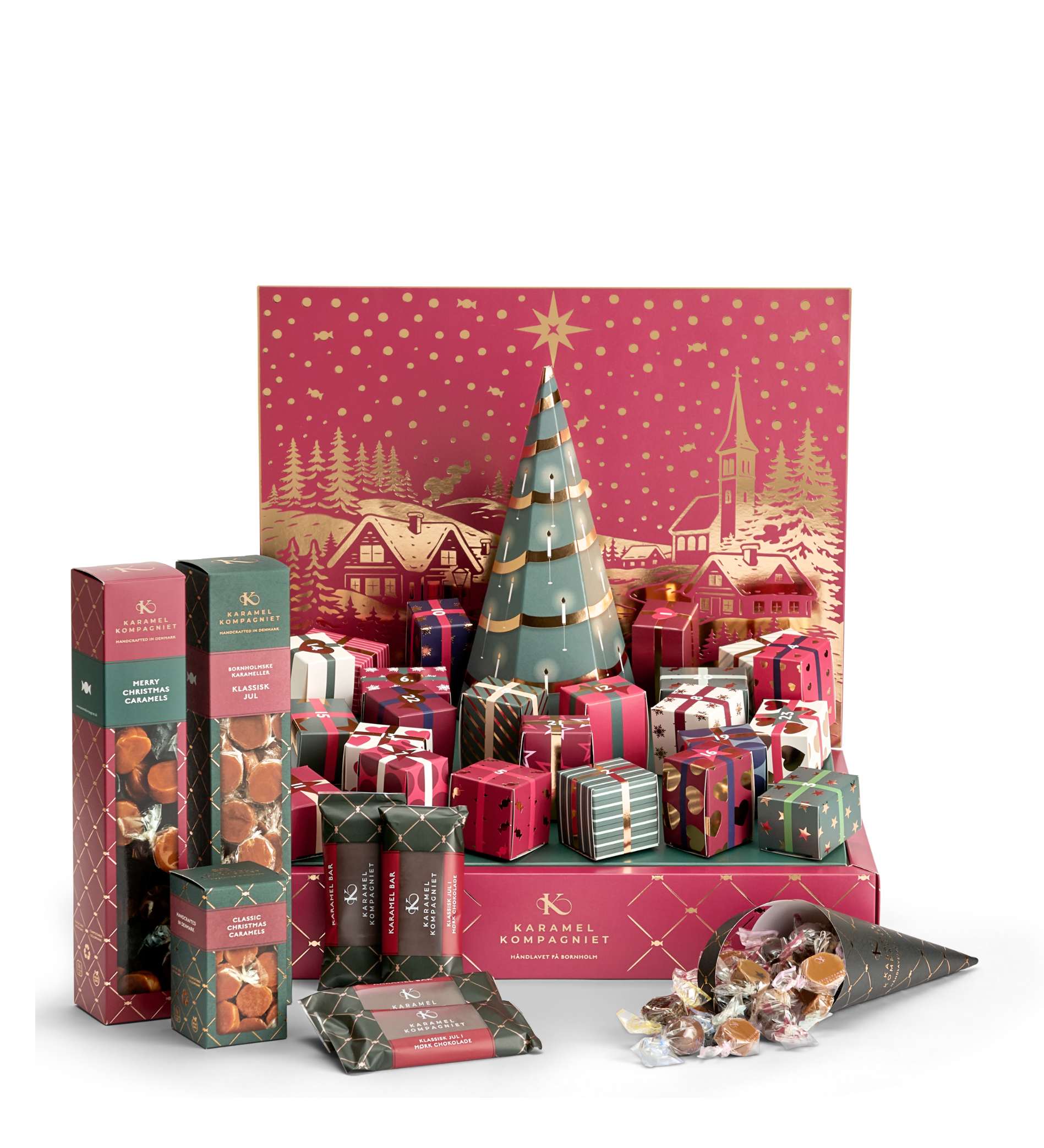 Karamel Kompagniets julekalender 2026 med julekalenderen, en æske merry christmas caramels, en lille æske flødekarameller, fire karamelbarer med julekarameller og en gratis gave, en klassik jul æske karameller