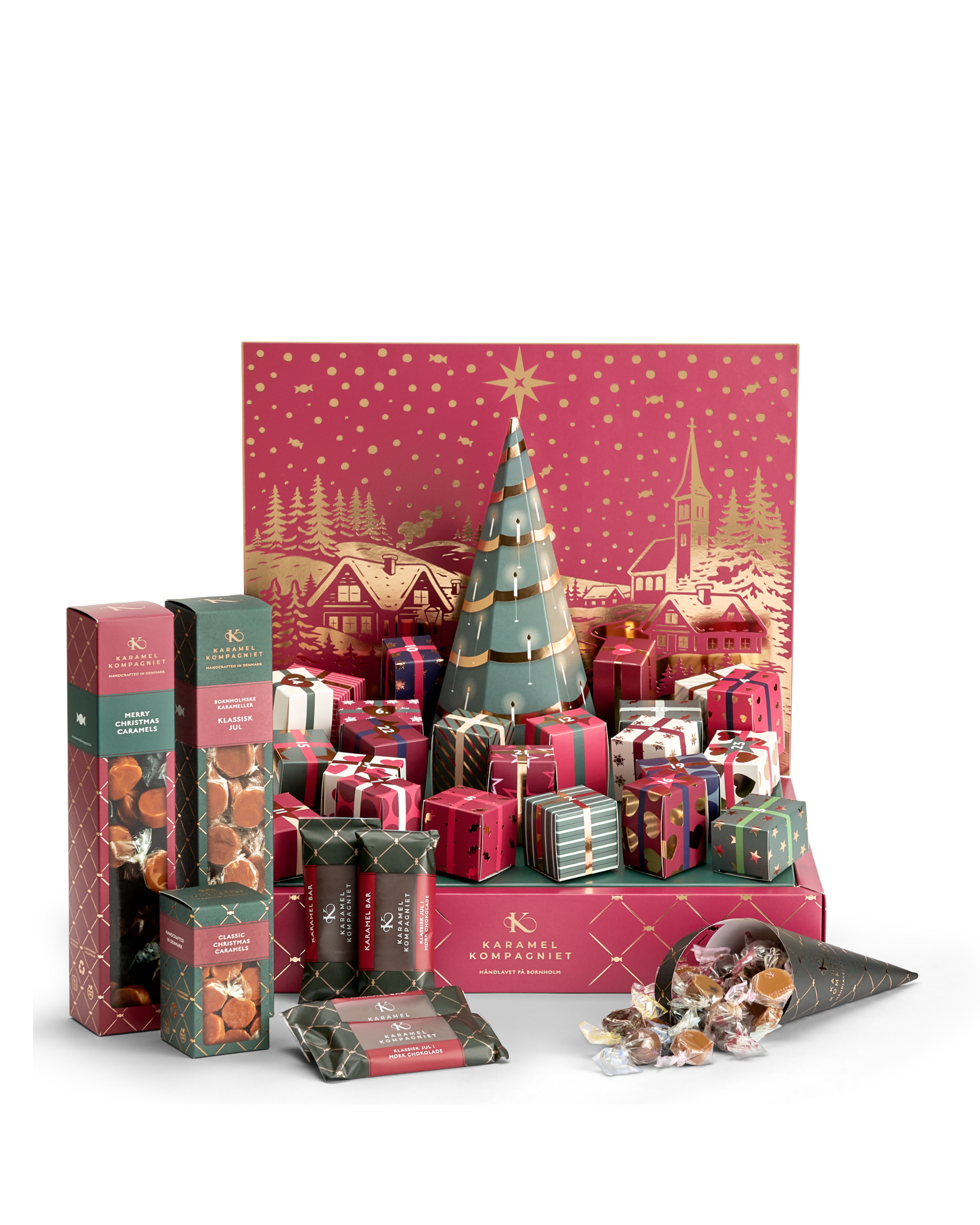 Karamel Kompagniets julekalender 2026 med julekalenderen, en æske merry christmas caramels, en lille æske flødekarameller, fire karamelbarer med julekarameller og en gratis gave, en klassik jul æske karameller